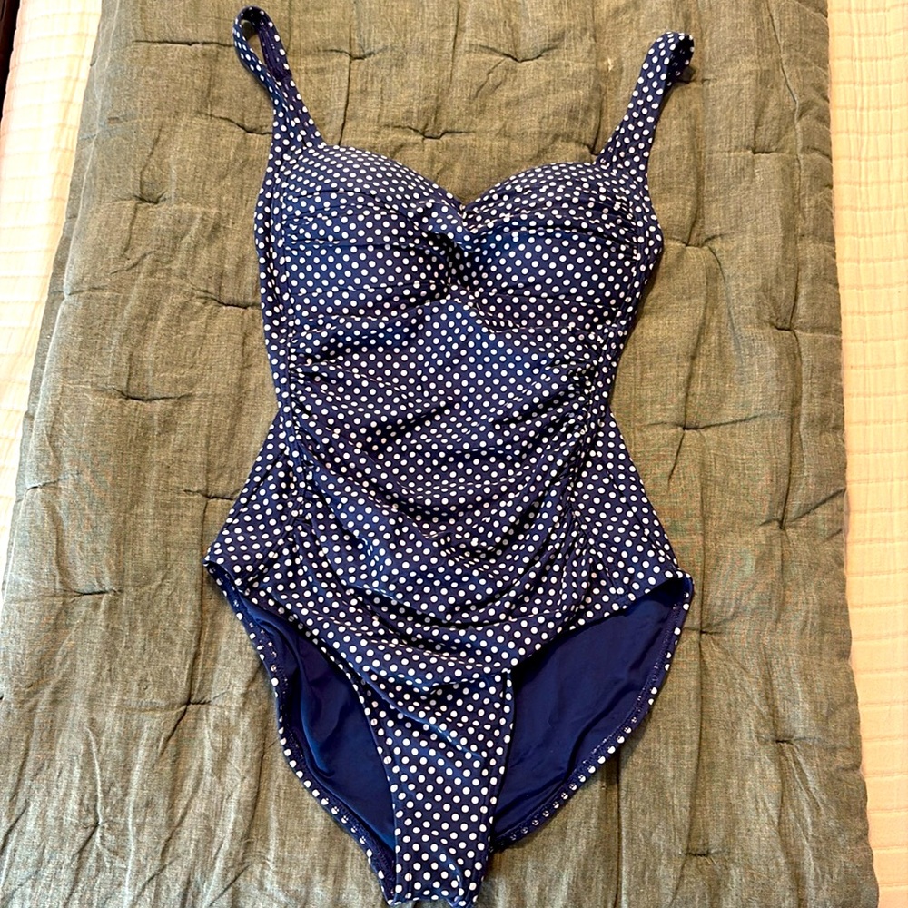 Nip tuck one piece polka dot swim suit